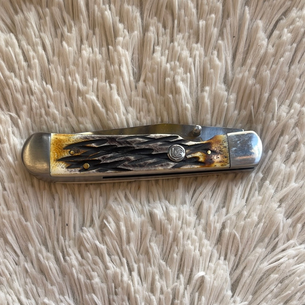 Whiskey Bent Carved Burnt Bone Trapper Lock Knife