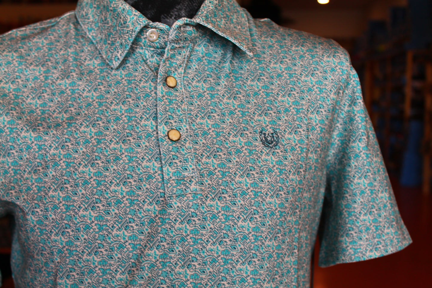 Panhandle Turquoise Floral Polo